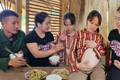 Pregnant girl cooks her own lunch waiting for simple and loving dishes